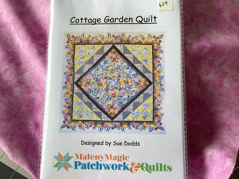 Cottage Garden Quilt a Pattern by Sue Dodds presented in Decoupage by In the Beginning Fabrics